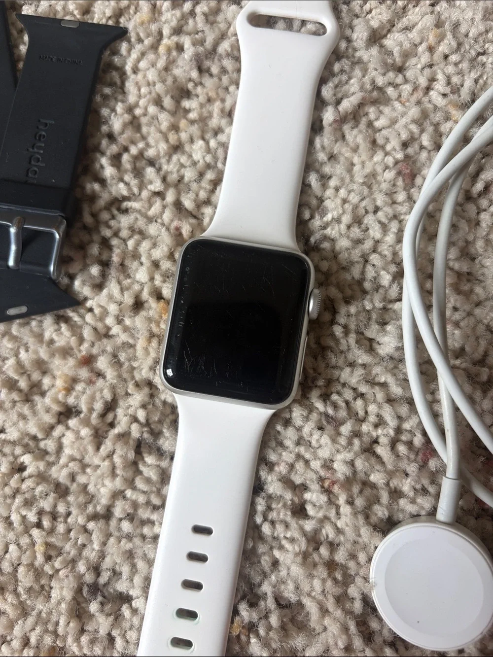 White Apple Watch Series 3 with Extra Bands and Magnetic Charger